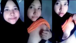 Abg Hijab Sengaja Buka Kancing Biar Toket Montoknya Keliatan.